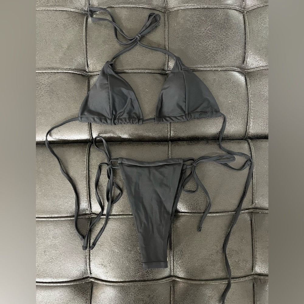 Matte Collection black two piece string bathing suit.